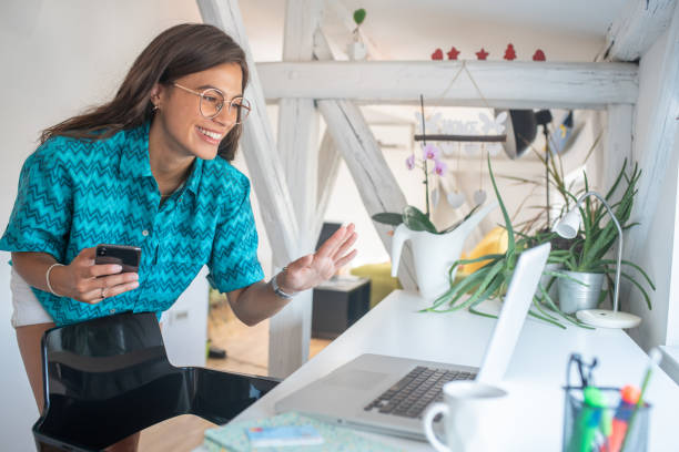 istock Young woman working from home 1411519545