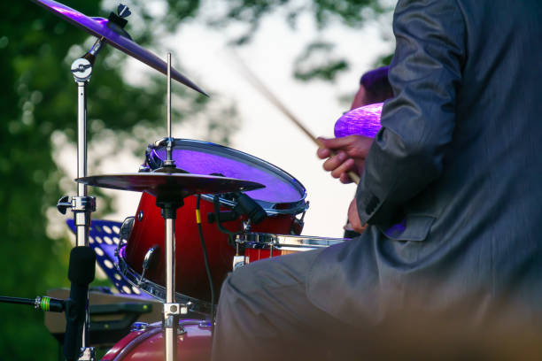 istock Drummer plays drums at open air festival (no face, hands close-up) 1411524005
