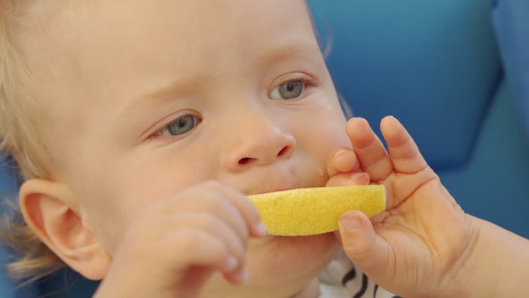 Baby Eating Lemon Stock Videos and Royalty-Free Footage - iStock Baby Eating Lemon Stock Videos and Royalty-Free Footage - iStock