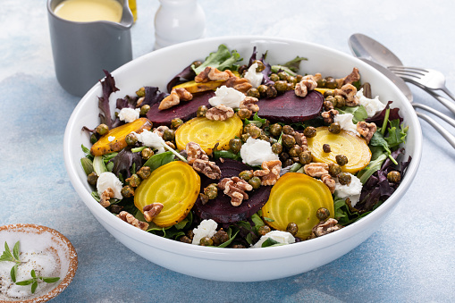 Beet salad with red and yellow beets with lemon dressing and crunchy roasted chickpeas