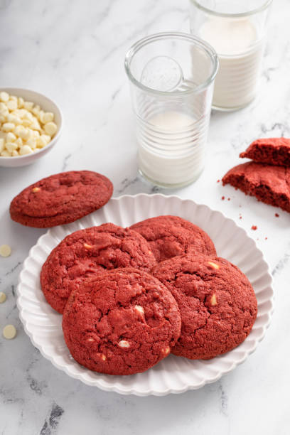 istock Red velvet cookies with white chocolate chips with milk 1411524557