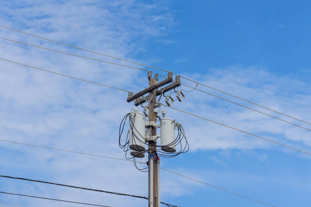 istock An electrical wire is seen on a wooden pillar that is surrounded by cables and electrical wires 1411527765
