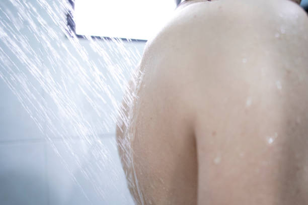 istock back of a woman bathing 1411527866