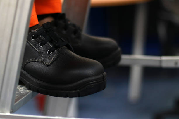 Safety shoes are made of leather to protect the feet of workers from work accidents Safety shoes are made of leather to protect the feet of workers from work accidents. Safety footwear is part of safety equipment safety first at work stock pictures, royalty-free photos & images