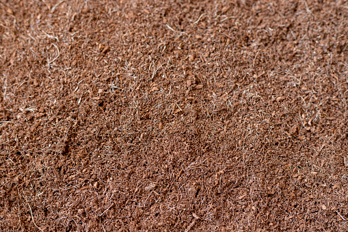 Coconut cocopeat husk chips surface background