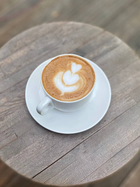 istock Hot coffee on wooden table 1411531981