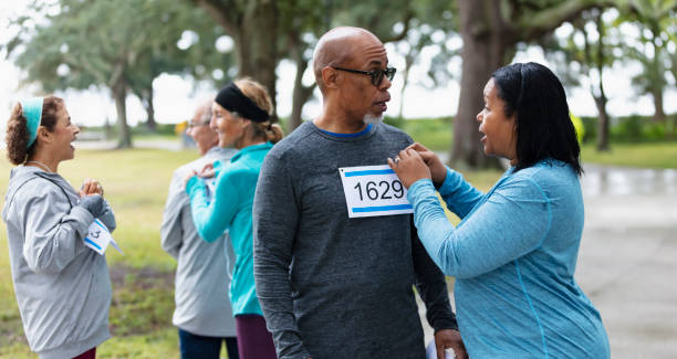 istock Senior African-American man getting ready to run a race 1411532269