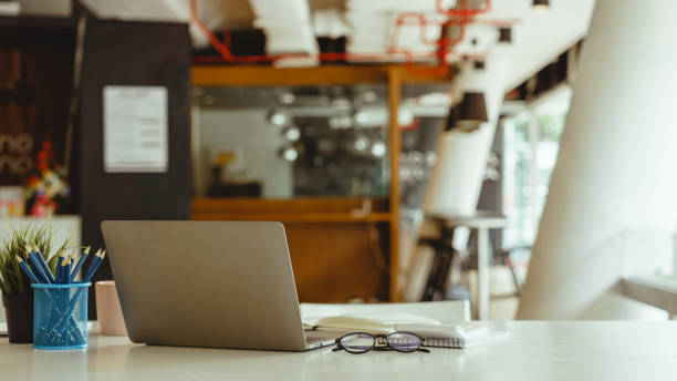 istock Laptop or notebook put on desk table of business workspace. 1411534056
