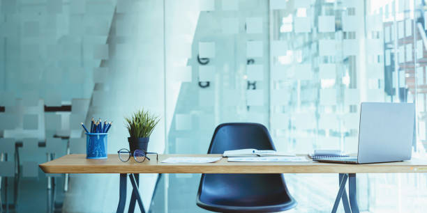 Laptop or notebook put on desk table of business workspace.