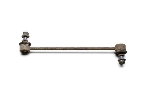 Old and rusty sway bar link  isolated on white, automotive car parts