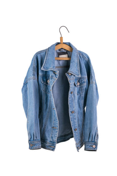 istock Unbuttoned women's denim jacket on a hanger isolated on a white background. 1411536120