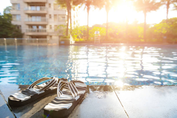 istock swimming pool in a sunny morning with sunflare horizontal composition 1411540036