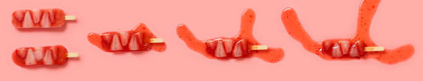 istock strawberry slices popsicle melting process on a pink background at top angle view 1411540261