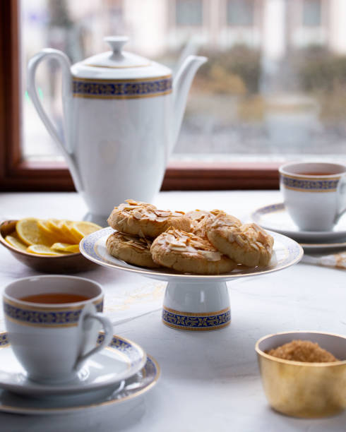 istock Cup of tea with cookies 1411549525