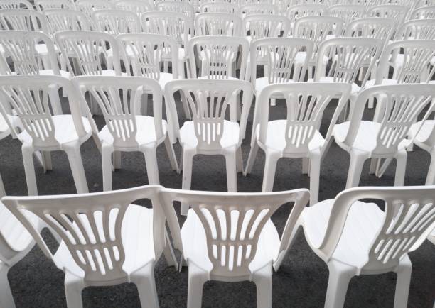 istock Some rows of White chairs waiting for an audience 1411549836