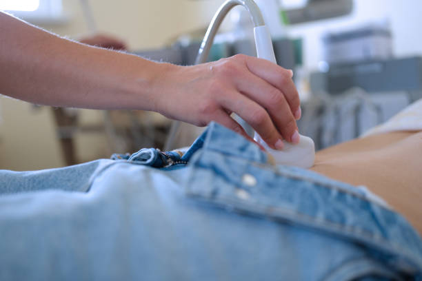 Ultrasound of uterus in early pregnancy to woman in clinic Ultrasound of uterus in early pregnancy to woman in clinic. Diseases of reproductive system in women concept Endometriosis stock pictures, royalty-free photos & images