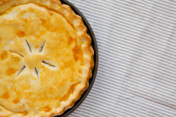 istock A Piece of Chicken Pot Pie, top view. Flat lay, overhead, from above. Space for text. 1411556986