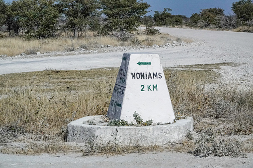 Road Sign to Noniams Waterhole in Etosha National Park at Kunene Region, Namibia