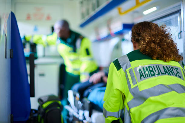 istock ambulance crew with patient 1411564354