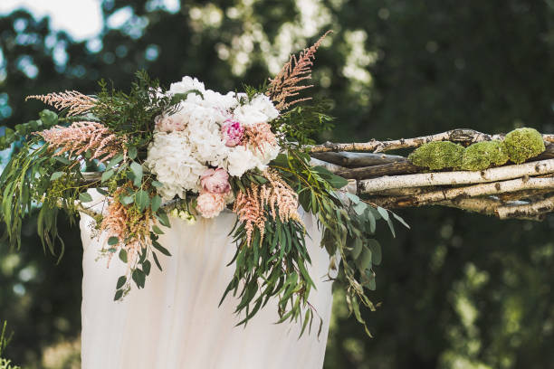 istock Flowers on the arch for the wedding ceremony 1411565680