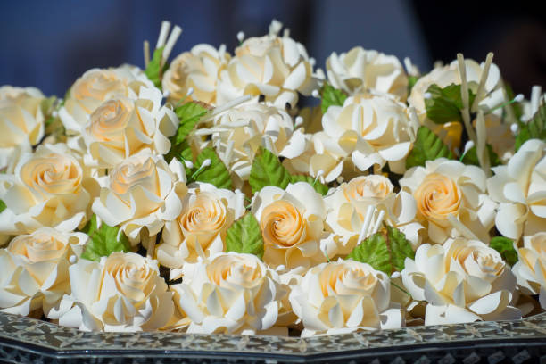 Sandalwood flowers are made from corn husks.\nUsed in traditional Buddhist funerals in Thailand