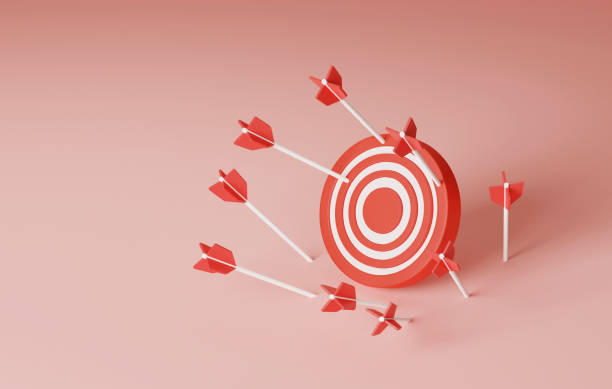 istock Several unsuccessful attempts at a red arrow that missed the target on a light red background. 1411567359