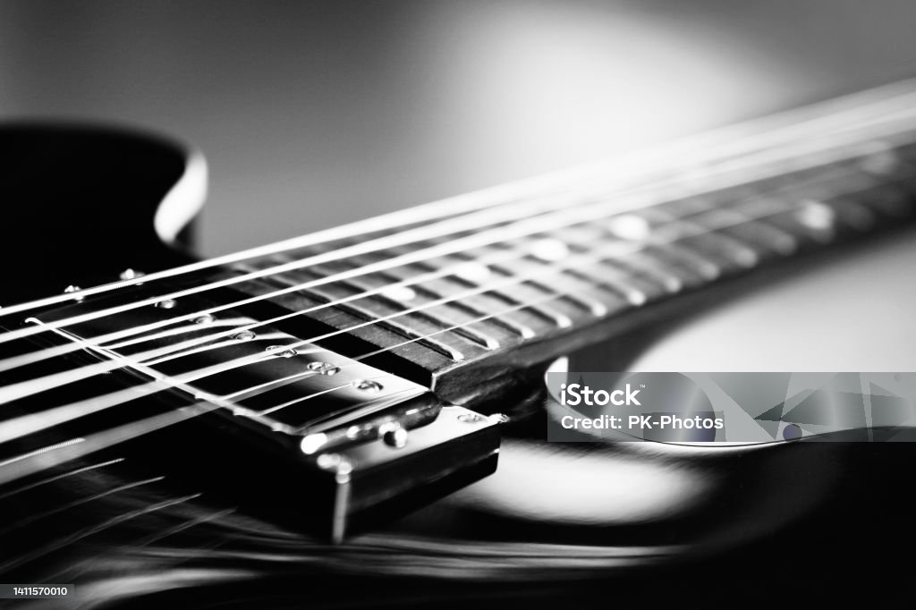 Close up shot of an electric guitar - Macro - Black and White Extreme Close up shot of an electric guitar in Black and White - selective focus Guitar Stock Photo