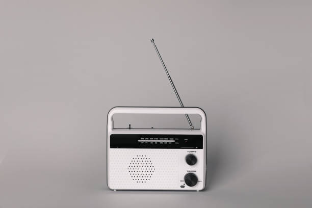 istock Portable retro radio receiver on grey background 1411571930