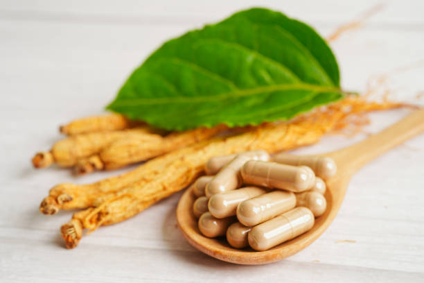 istock Ginseng roots and green leaf, healthy food. 1411572396