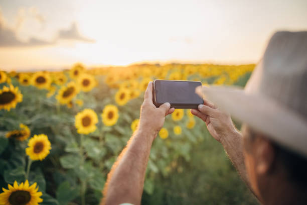 istock A man uses a smartphone, sends an online video message 1411573255