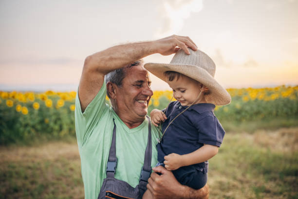 istock Cheerful farmer and grandson 1411573328