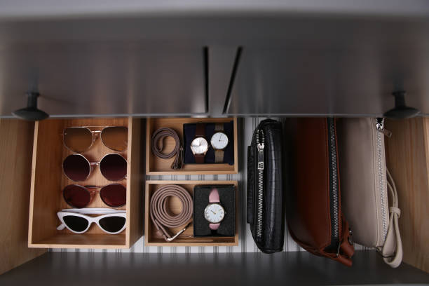 istock Open drawer with different stylish accessories indoors, top view. Storage and organizing 1411574842