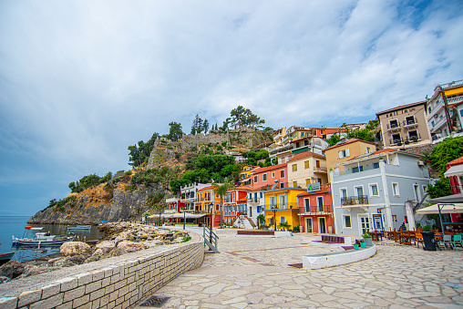 06 June 2022, PARGA, GREECE, Panoramic view of the amazing coastal city of Parga at daylight with beautiful, decorated streets, buildings, shops, and restaurants.