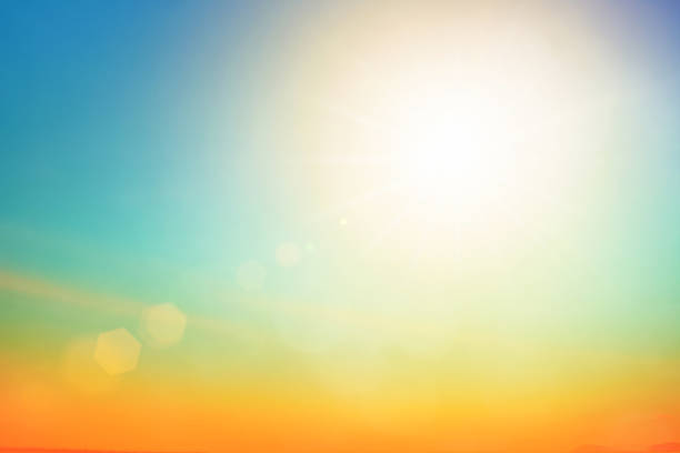 istock Relaxing outdoors vacation landscape concept: Abstract blurred sunlight beach colorful blurred bokeh background with retro effect autumn sunset sky have blue bright, white, and color orange calm. 1411584217