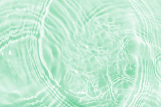 istock Water panoramic banner background. Water texture, water surface with rings and ripple. Spa concept background. Flat lay, top view, copy space, composition 1411584326