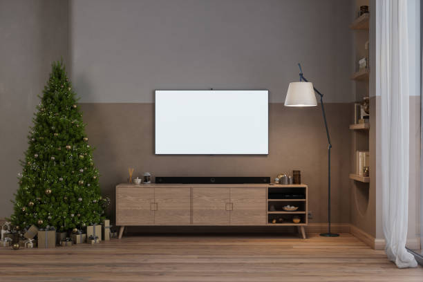 intérieur de salon moderne avec arbre de noël, boîtes cadeaux et maquette de télévision intelligente avec écran blanc - tree house audio photos et images de collection
