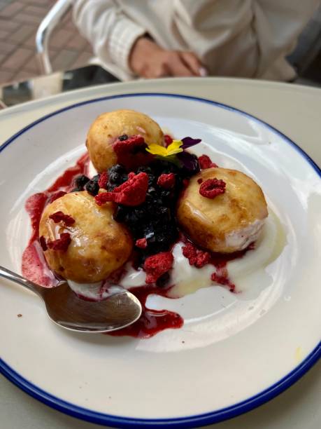 istock cottage cheese pancakes with berries and sour cream 1411591935
