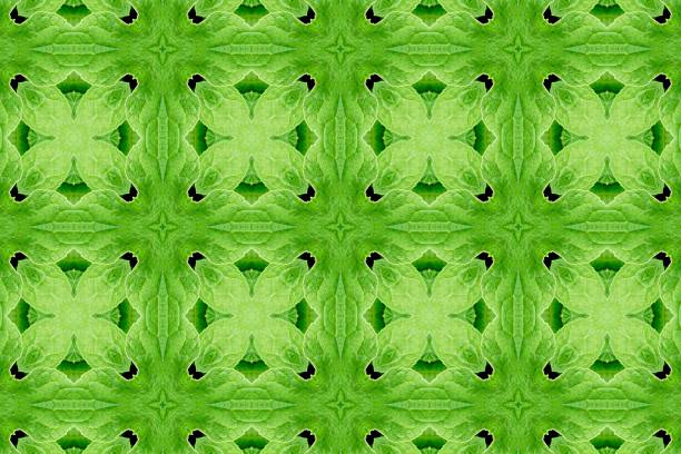 green abstract textured background, symetric shapes