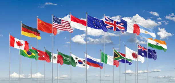 20 flags. G20 Bali summit is the upcoming seventeenth meeting of Group of Twenty, Bali, Indonesia in 2022. Blue sky background. 3d Illustration.