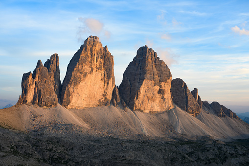 Stunning view of the Three Peaks of Lavaredo, (Tre cime di Lavaredo) during a beautiful sunset. The Three Peaks of Lavaredo are the undisputed symbol of the Dolomites, Italy.