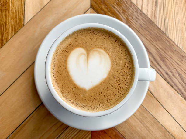 istock A cup of coffee latte on a wooden table 1411600137