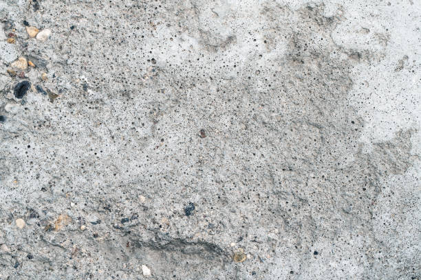 istock Natural grunge dirty rough concrete texture background 1411600996