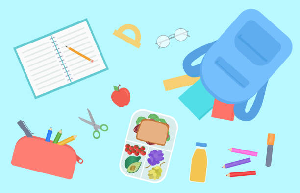 back to school konzept. draufsicht auf den schülertisch mit lunchbox, rucksack, buntstiften und schulmaterial - textbook book apple school supplies stock-grafiken, -clipart, -cartoons und -symbole