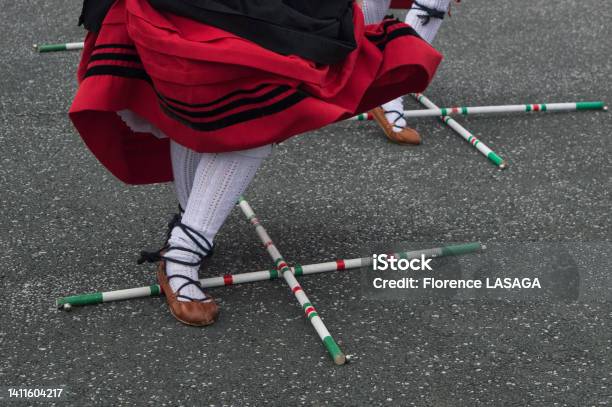Basque Dance In Traditional Costume With Cross Sticks On The Floor Stock Photo - Download Image Now