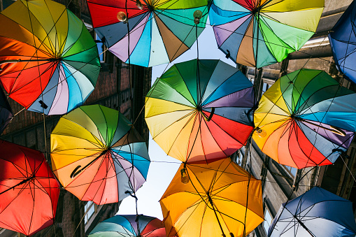 Colorful umbrellas hanging on the street in the karakoy district of Istanbul