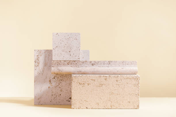 istock Abstract modern still life. Natural materials. Composition of travertine and concrete blocks. 1411611543