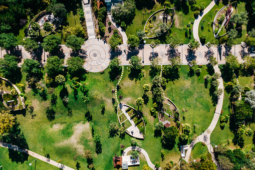 Lisbon, Portugal - July 29, 2022: Aerial drone view of Parque dos Poetas in Oerias, translated to Poet's Park, 25-acre landscaped park with large sculptures of 20 prominent Portuguese poets