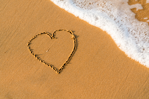 heart symbol on the sand