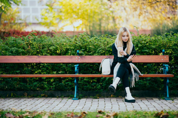 istock Young woman using the phone 1411621889