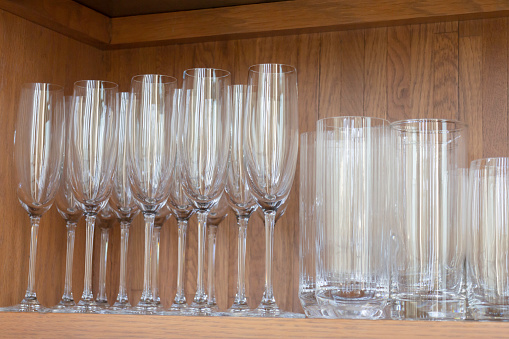 Kitchen cabinet close up with glass shelves, stock photo